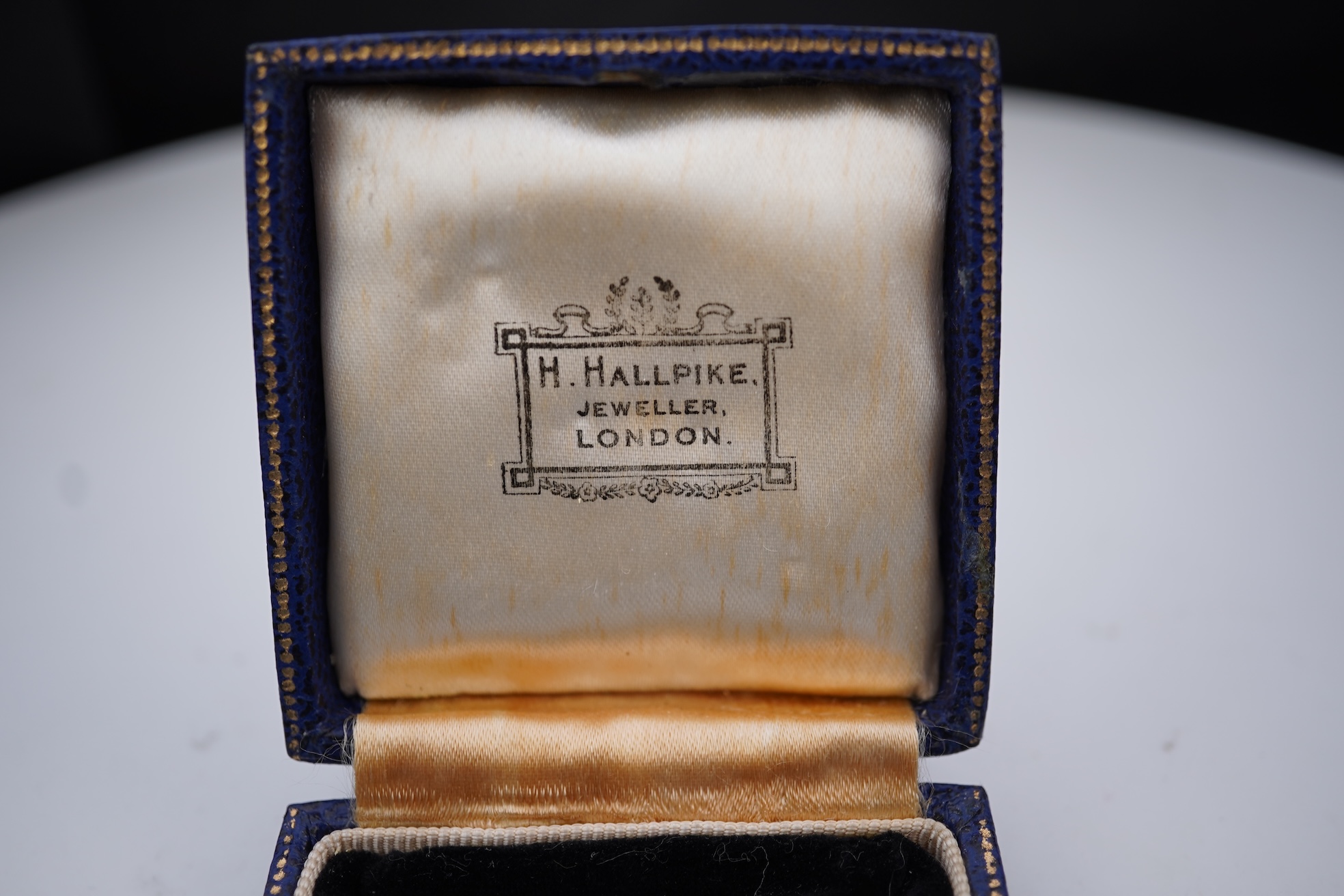 An opal and diamond pendant, early 20th century